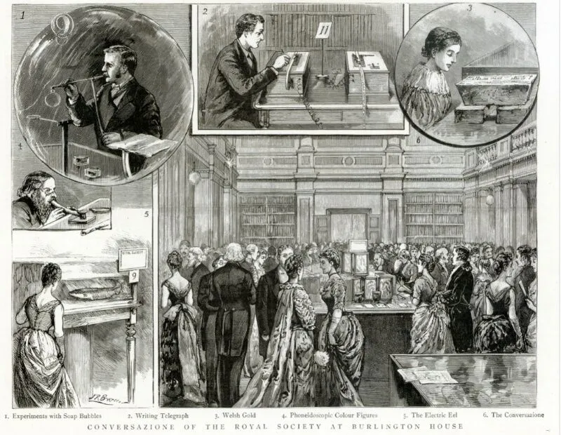 Victorian-era illustration showing scientific demonstrations, including telegraphs, experiments, and people observing in a grand hall at the Royal Society. Figures in period clothing gather around various exhibits.