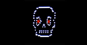 Screenshot from early 80s video game of a skull.
