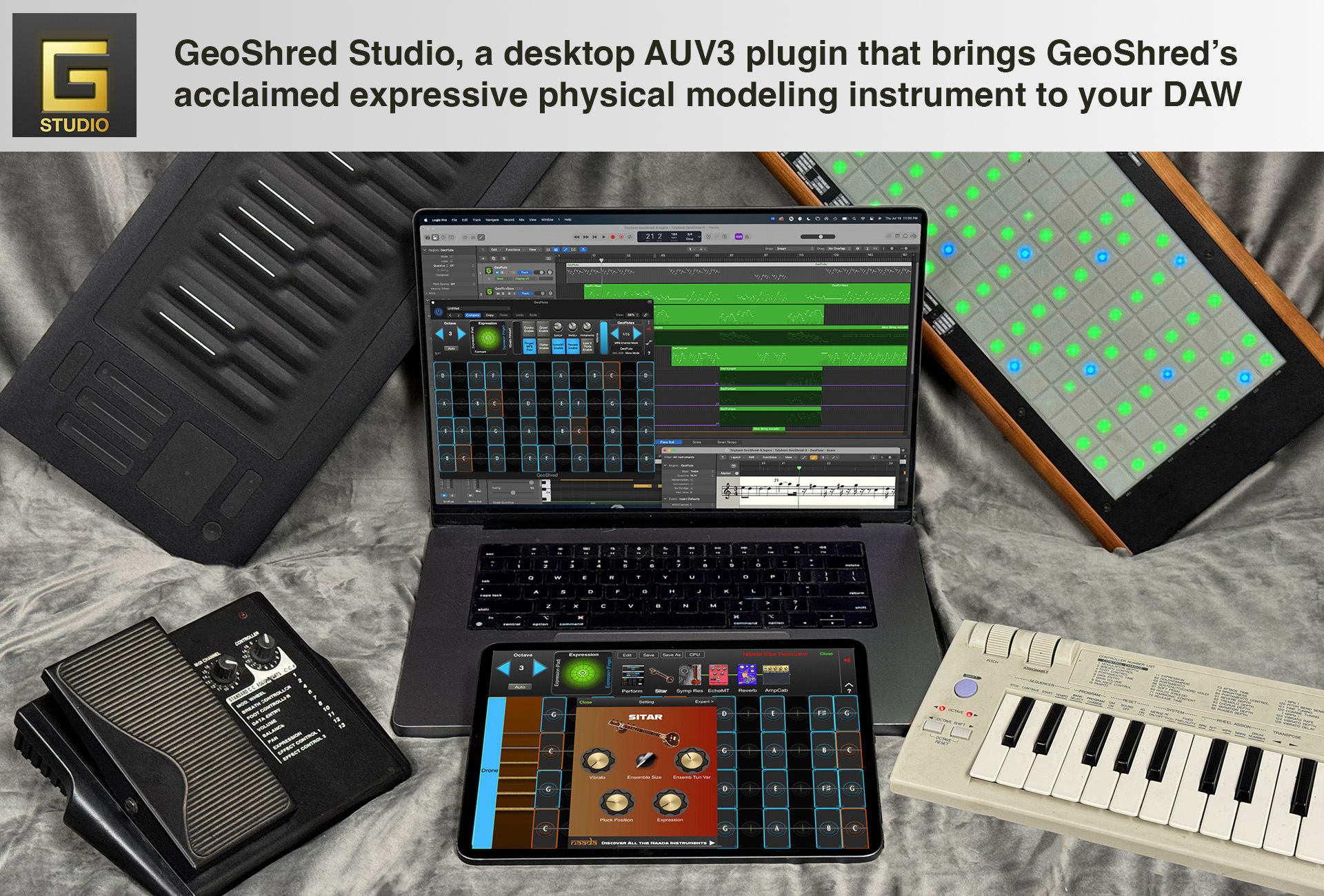 A laptop running GeoShred Studio is surrounded by MIDI controllers, a keyboard, a pedal, and a ROLI Seaboard. The screen displays a digital audio workstation interface with various tracks and controls.