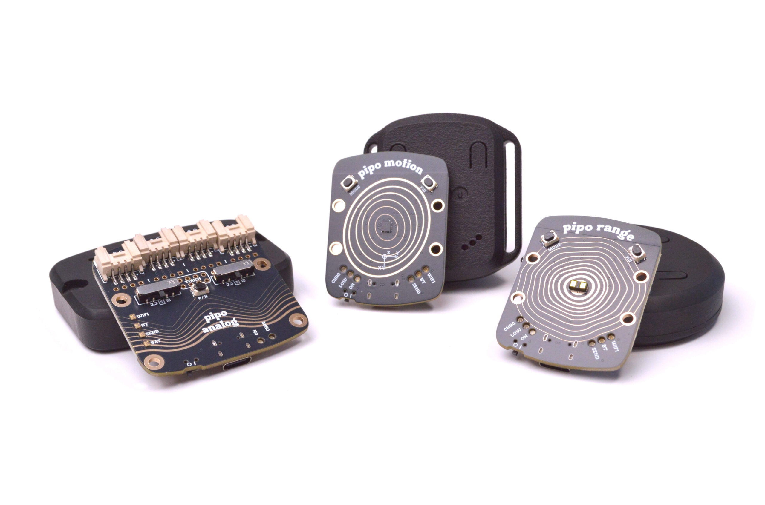 Three small black electronic devices with circular circuit patterns and labeled pipo motion, pipo range, and pipo analog are displayed on a white background.