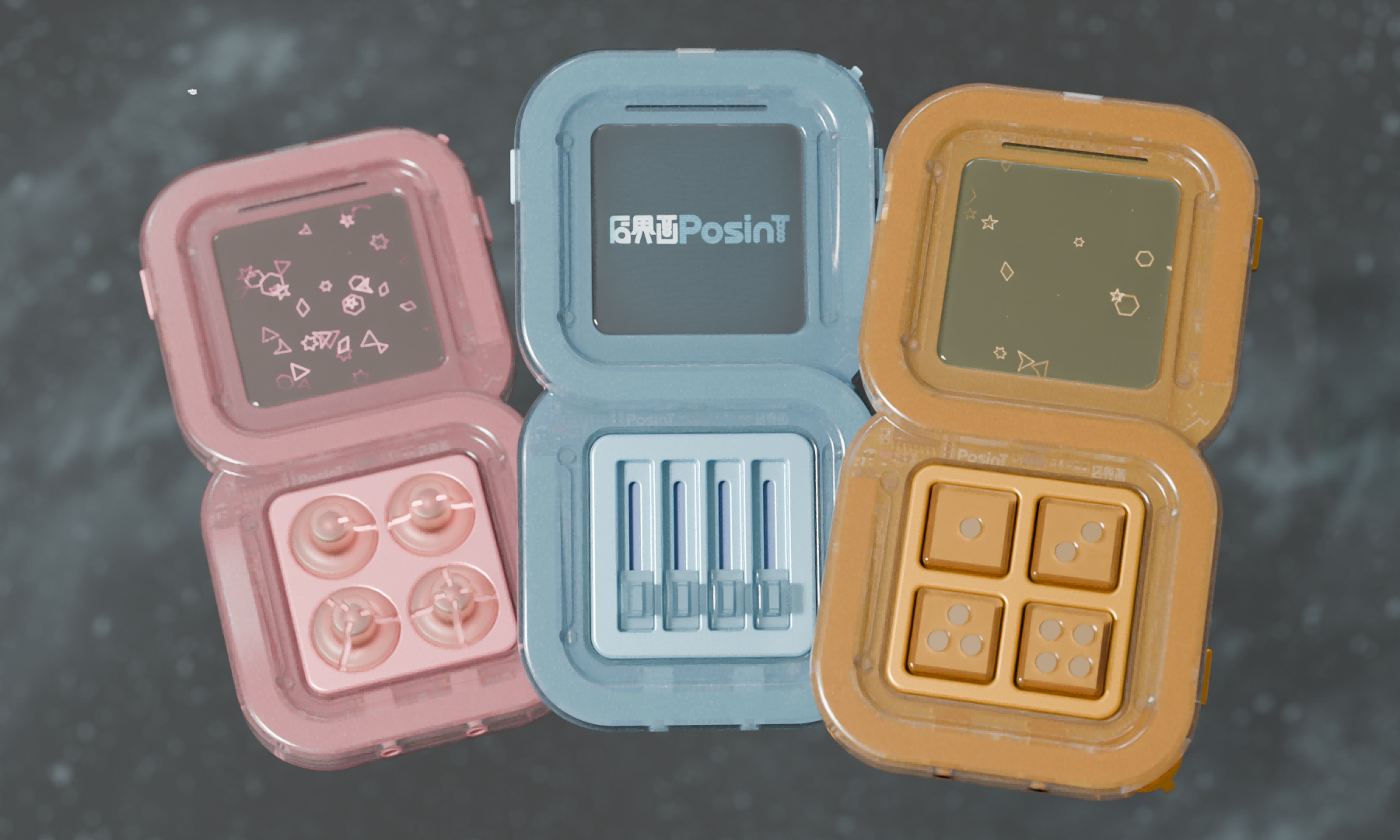 Three pastel-colored plastic cases (pink, blue, yellow) are open, each with Tetris-like designs on the lids and various small gaming-themed components, such as buttons and thumbsticks, inside each compartment.